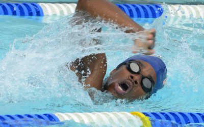 MITCHELLVILLE, MD - July 14: Kingfish swimmer Jelani Boone cuts through the water during his age group's freestyle event at the Lake Arbor Community Pool in Mitchellville, Maryland on July 14, 2012. (Photo by Doug Kapustin/For The Washington Post)